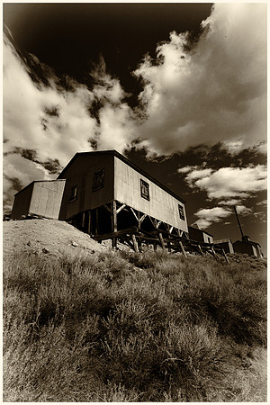 Black and White image of abandoned mill in the ghost town of Bodie, CA